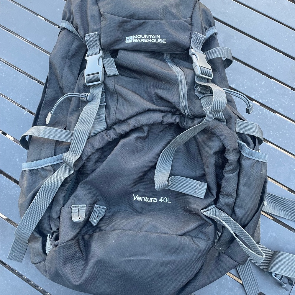 Black Backpack with Adjustable Straps for Outdoor Adventures used once